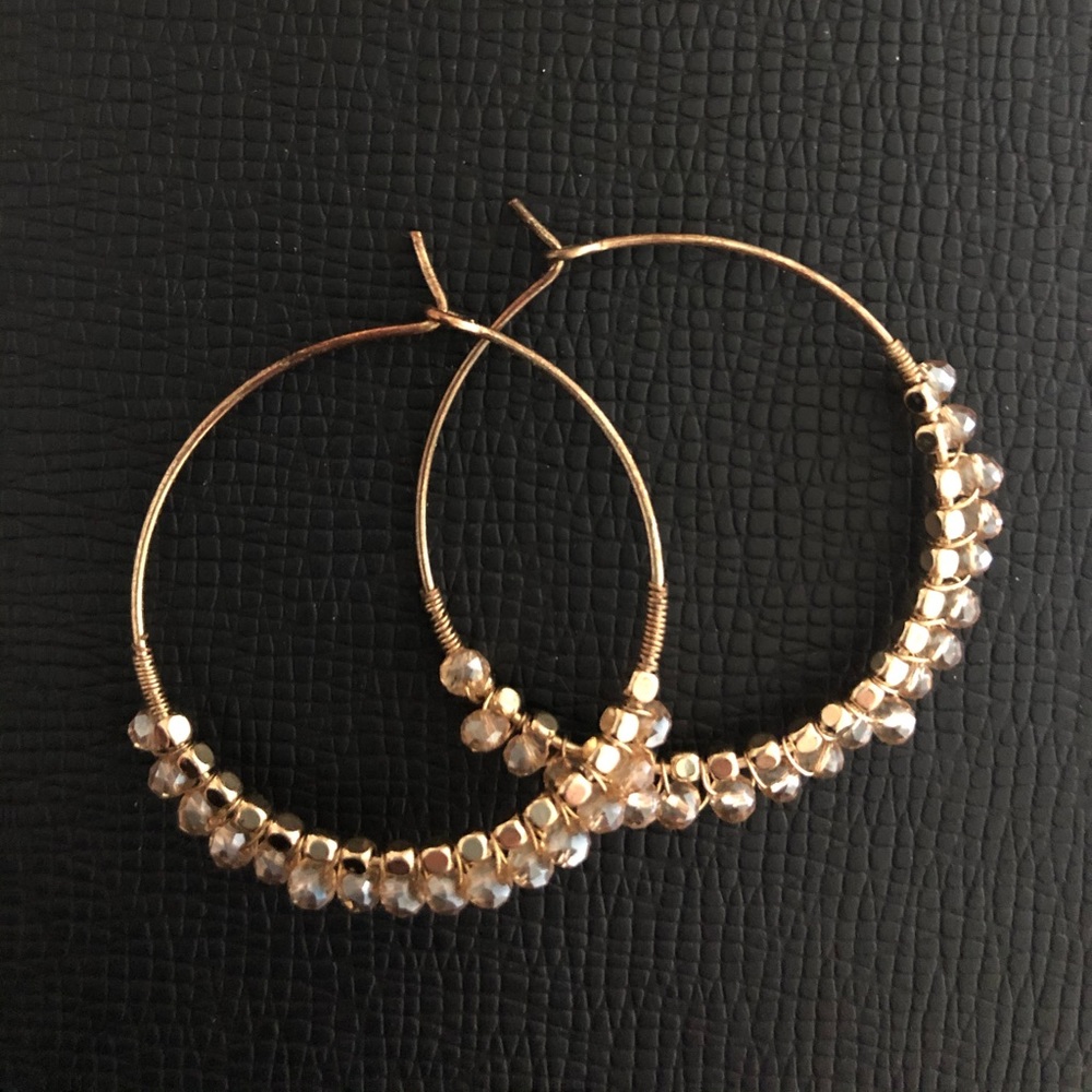 Gold small hoop earrings with pretty jewels
